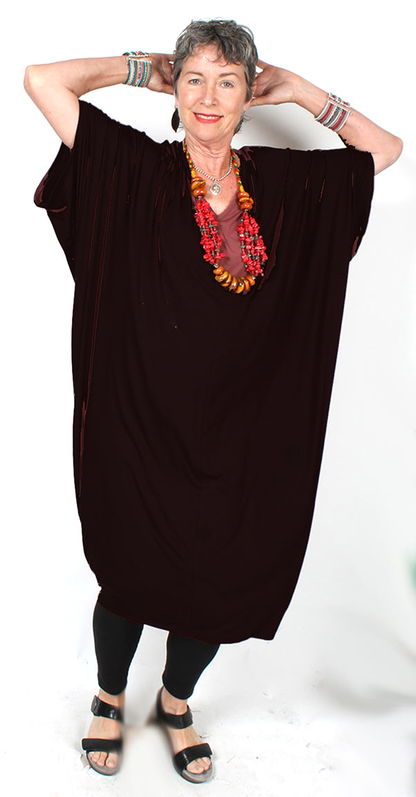 The Essential Black Cocoon Dress – Stretch, Style & Seasonal Magic